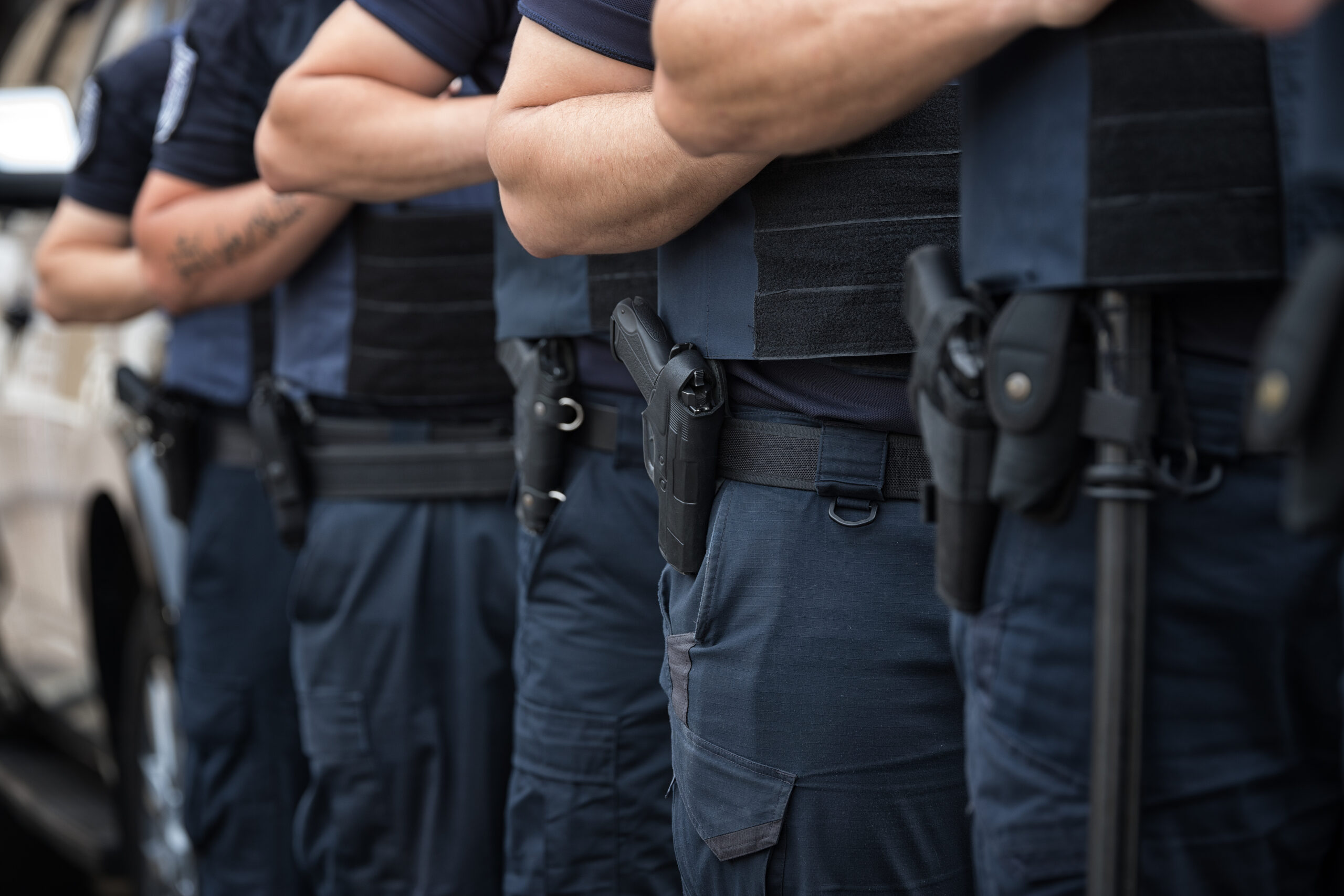 Soldiers guards in formation, ammunition, equipment and weapons, with a shallow depth of field